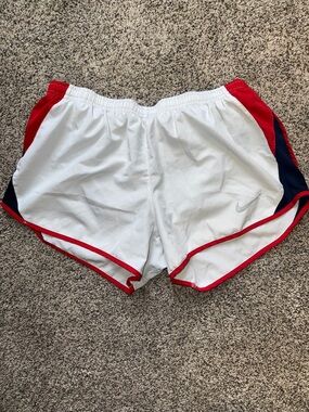 Nike Women’s White Athletic Shorts with Red Trim and Navy Panels